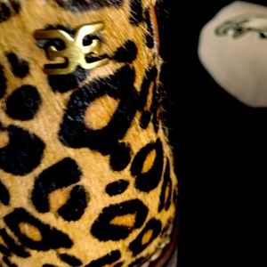 Pair of leopard print ankle boots, leather interior